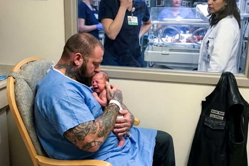 [PART 2 The NICU camera caught a six-foot-six biker rocking a screaming premature newborn against his tattooed chest, and every nurse in the room wondered why he had come alone.